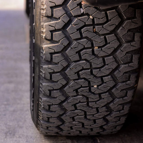 small rocks in tire tread